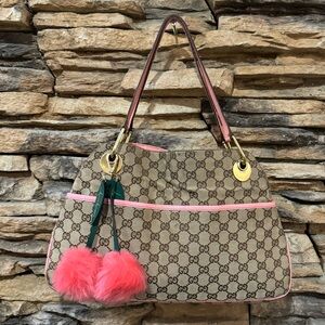 Vintage Gucci pink shoulder purse with Gucci Pom poms inside and outside pocket